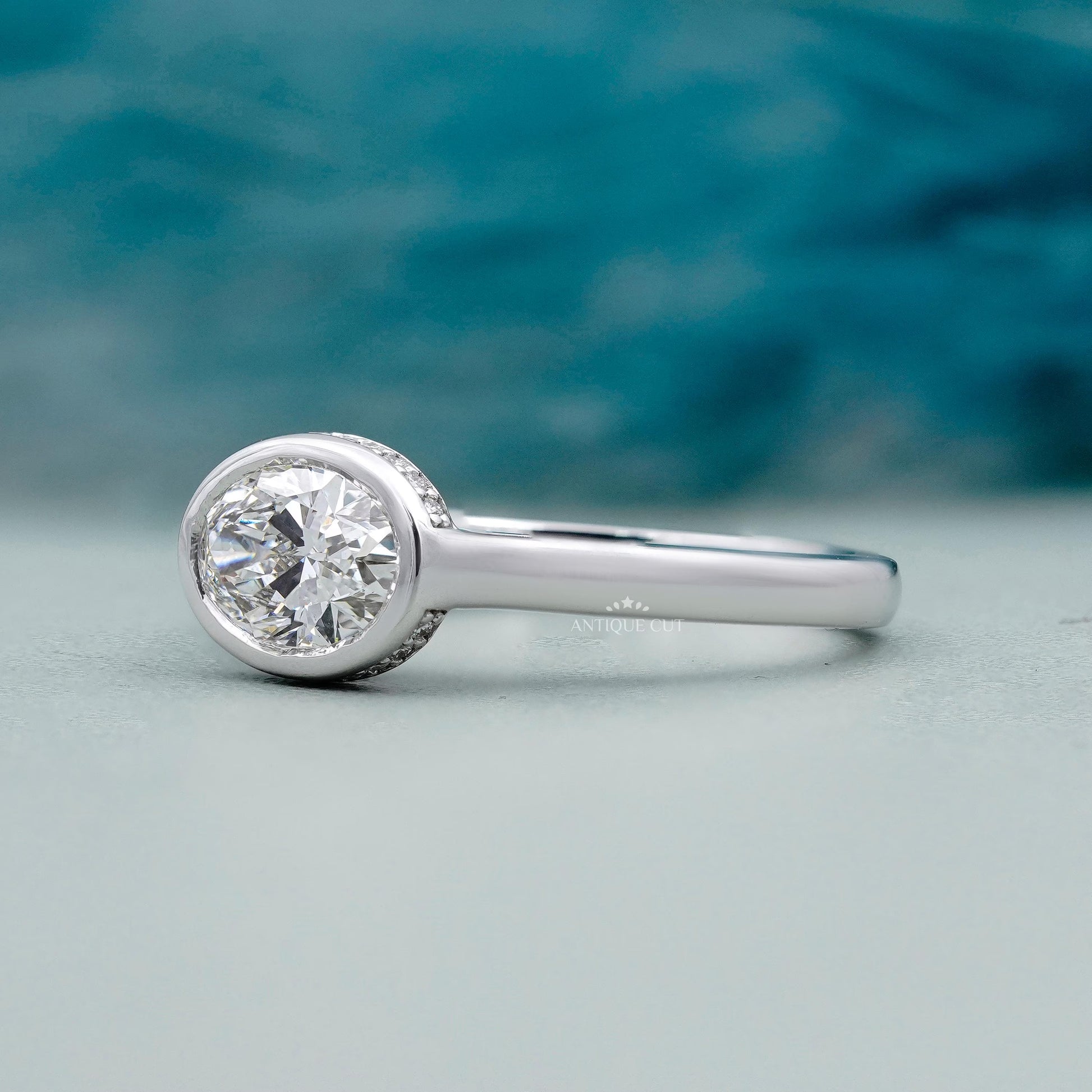 Modern east west oval diamond engagement ring