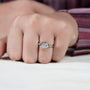 East west oval diamond ring with halo design