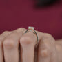 Classic round cut diamond ring with twisted shank