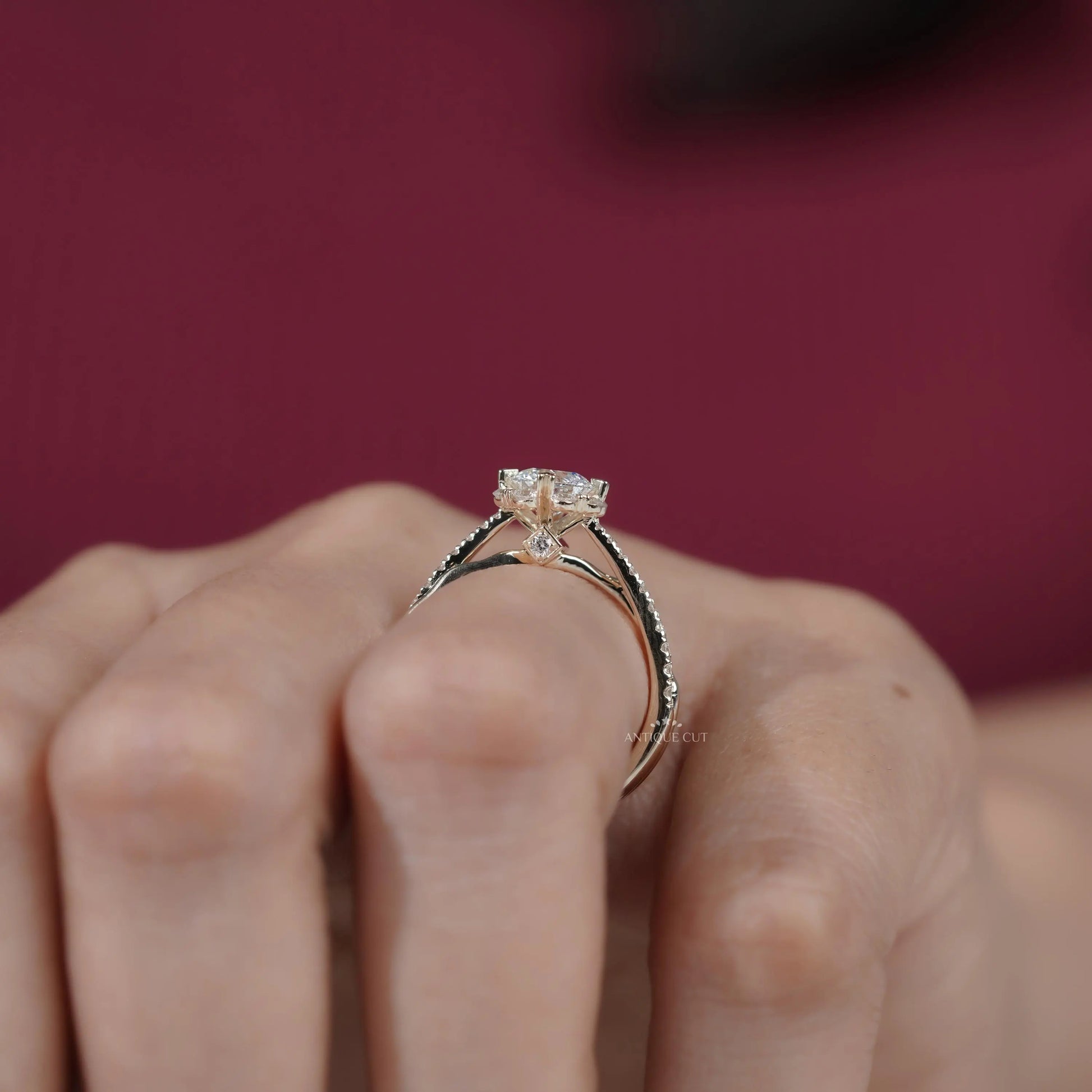 Classic round cut diamond ring with twisted shank