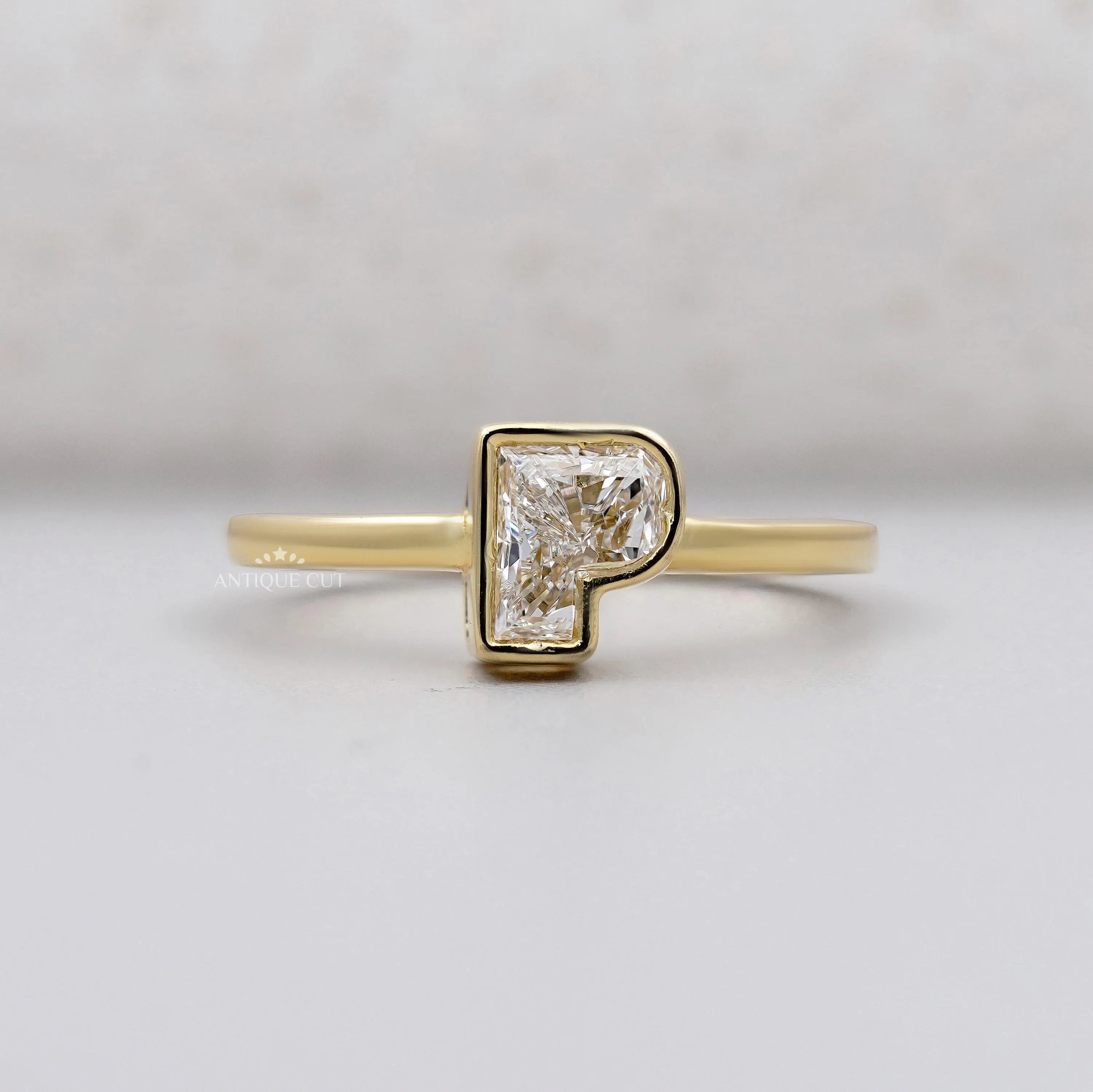 Gold P initial ring with diamond