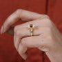 Emerald cut ring with filigree design