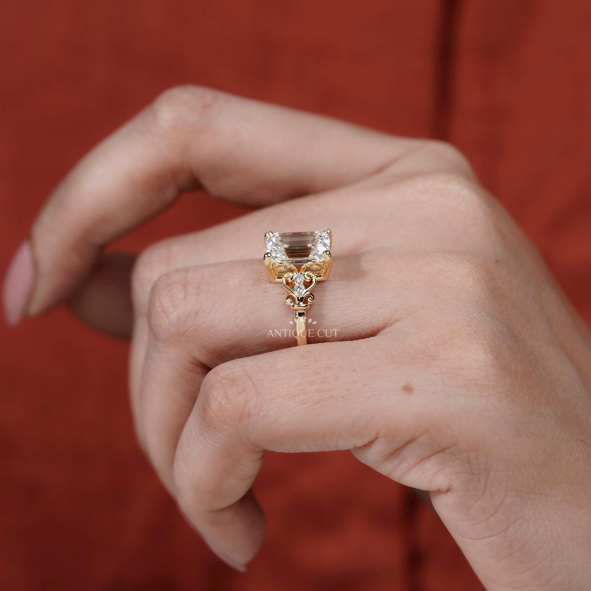 Emerald cut ring with filigree design