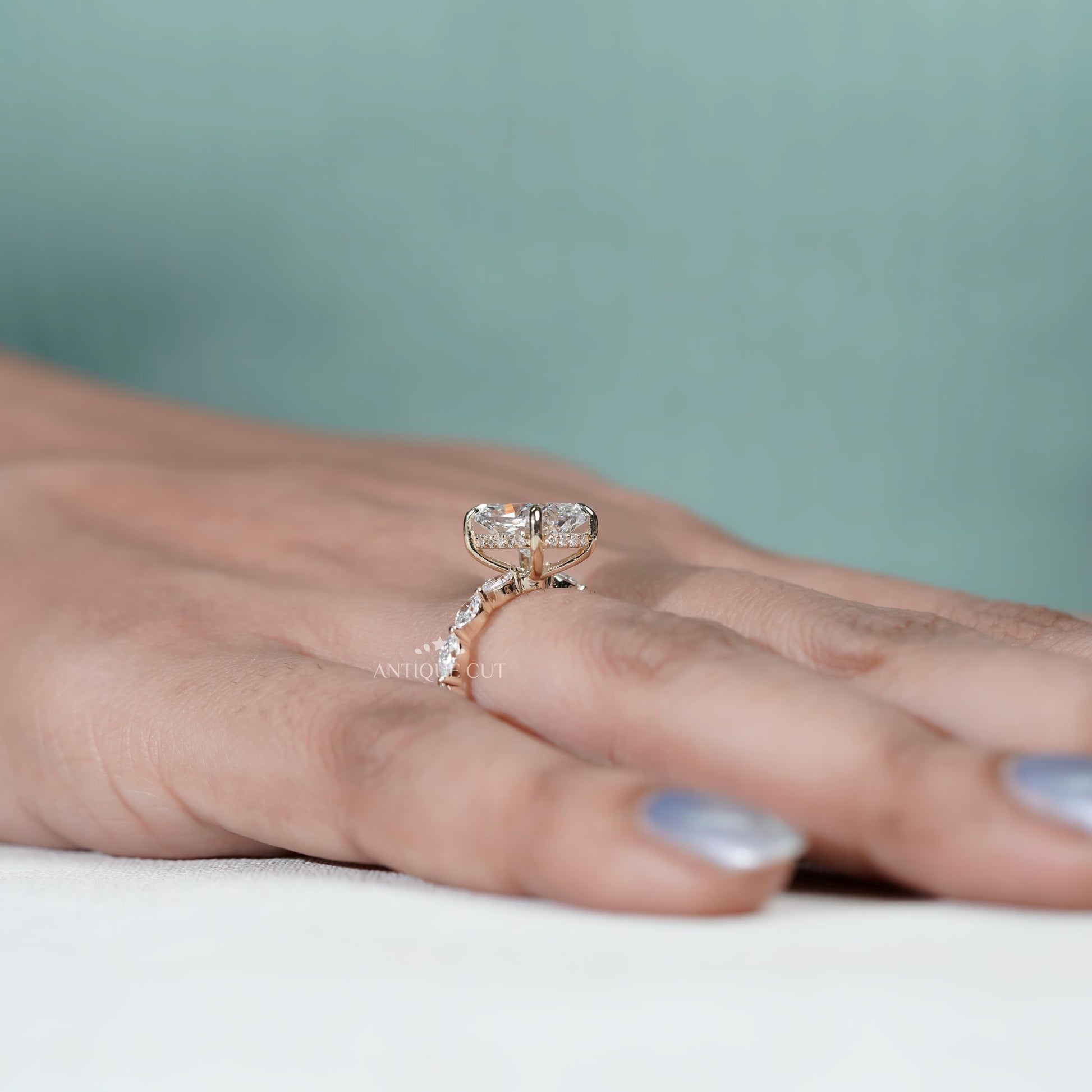 Bridal cushion engagement ring yellow gold