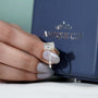 Close-up hidden halo diamond ring sparkle