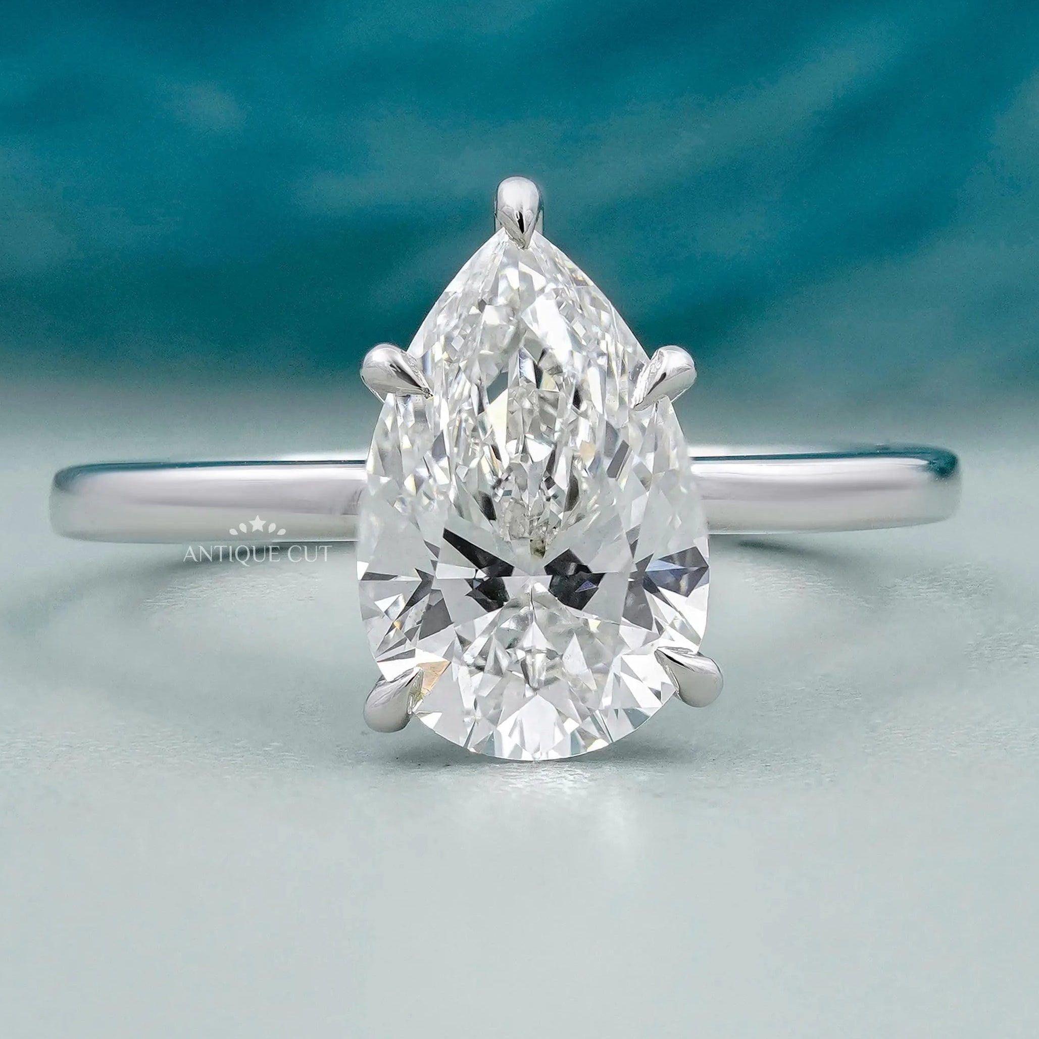 Pear cut solitaire engagement ring