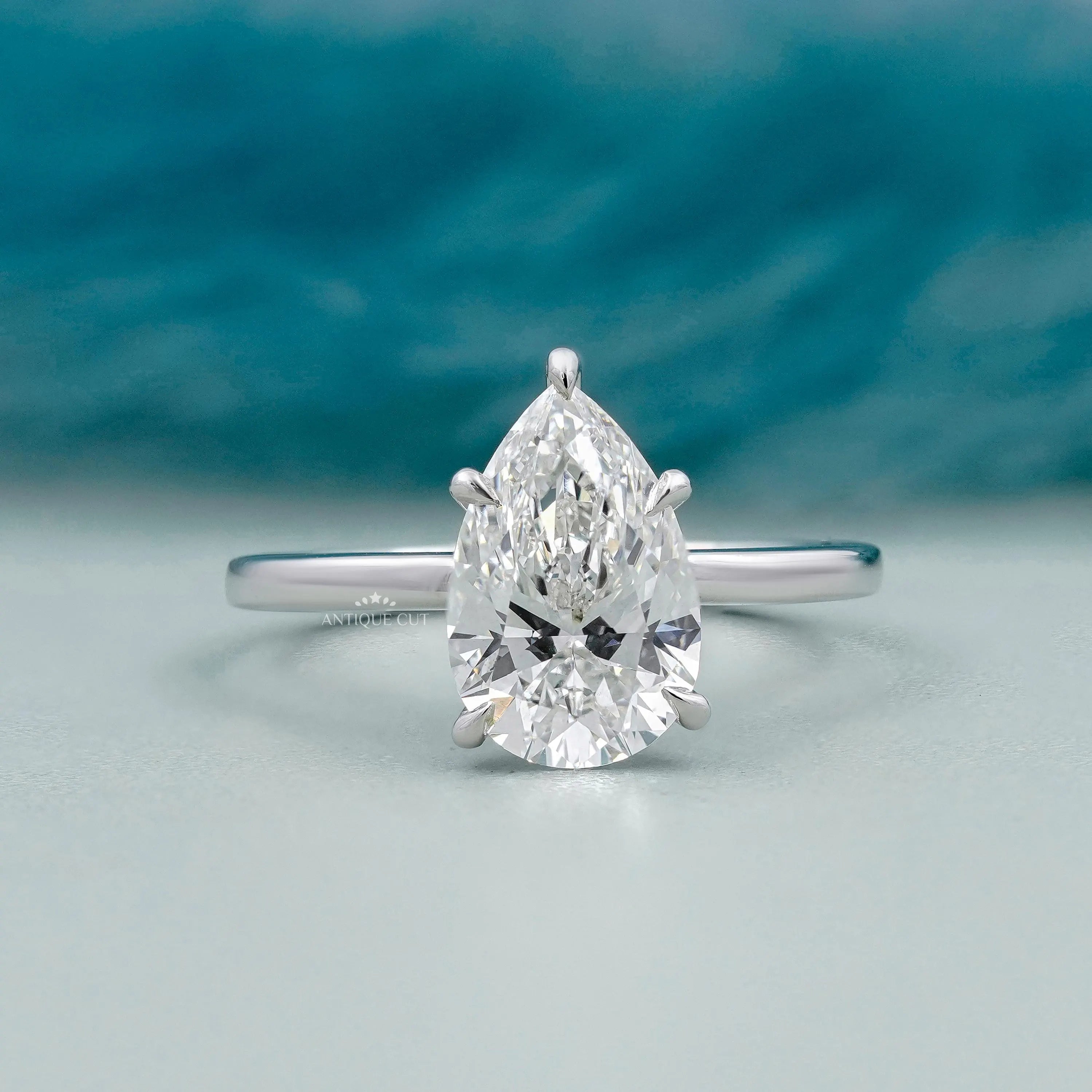Pear cut solitaire engagement ring