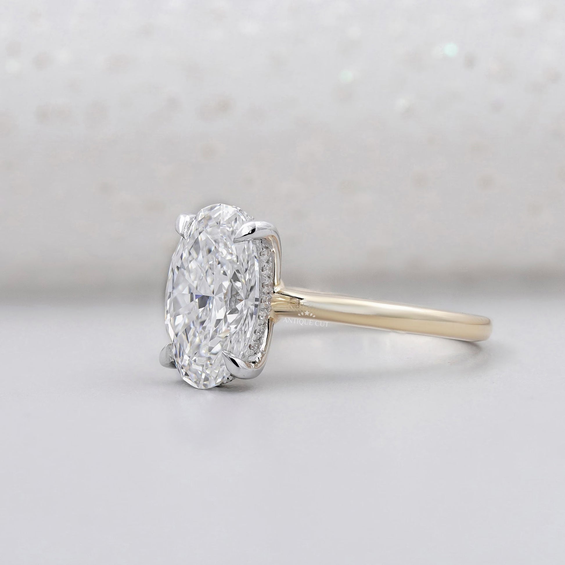 Solitaire diamond oval engagement ring