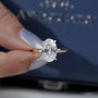 Elegant oval engagement ring hidden halo