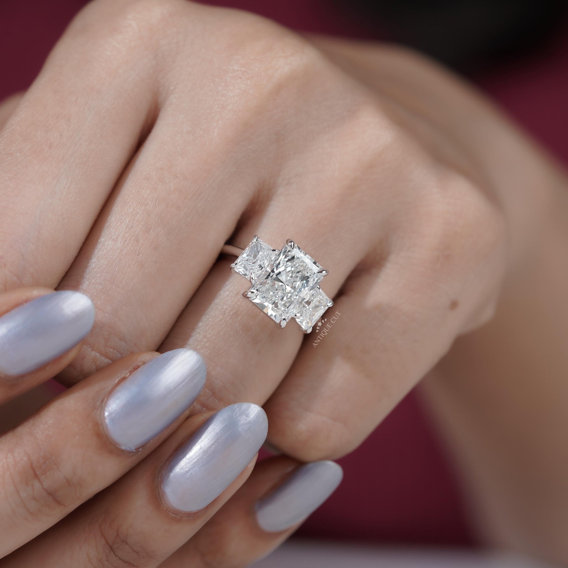 Classic three stone diamond ring white gold