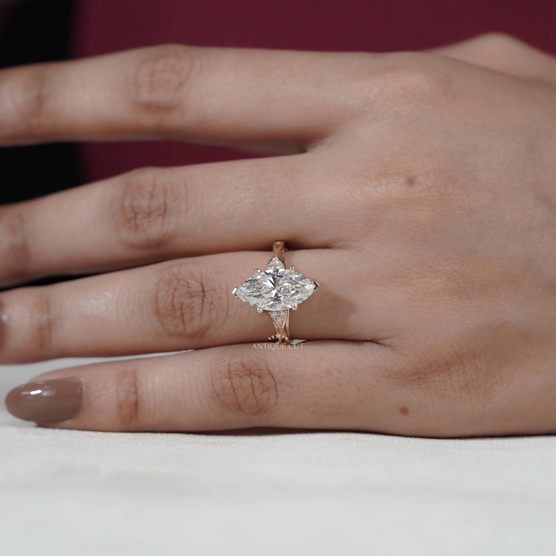 Unique marquise diamond proposal ring with gold band