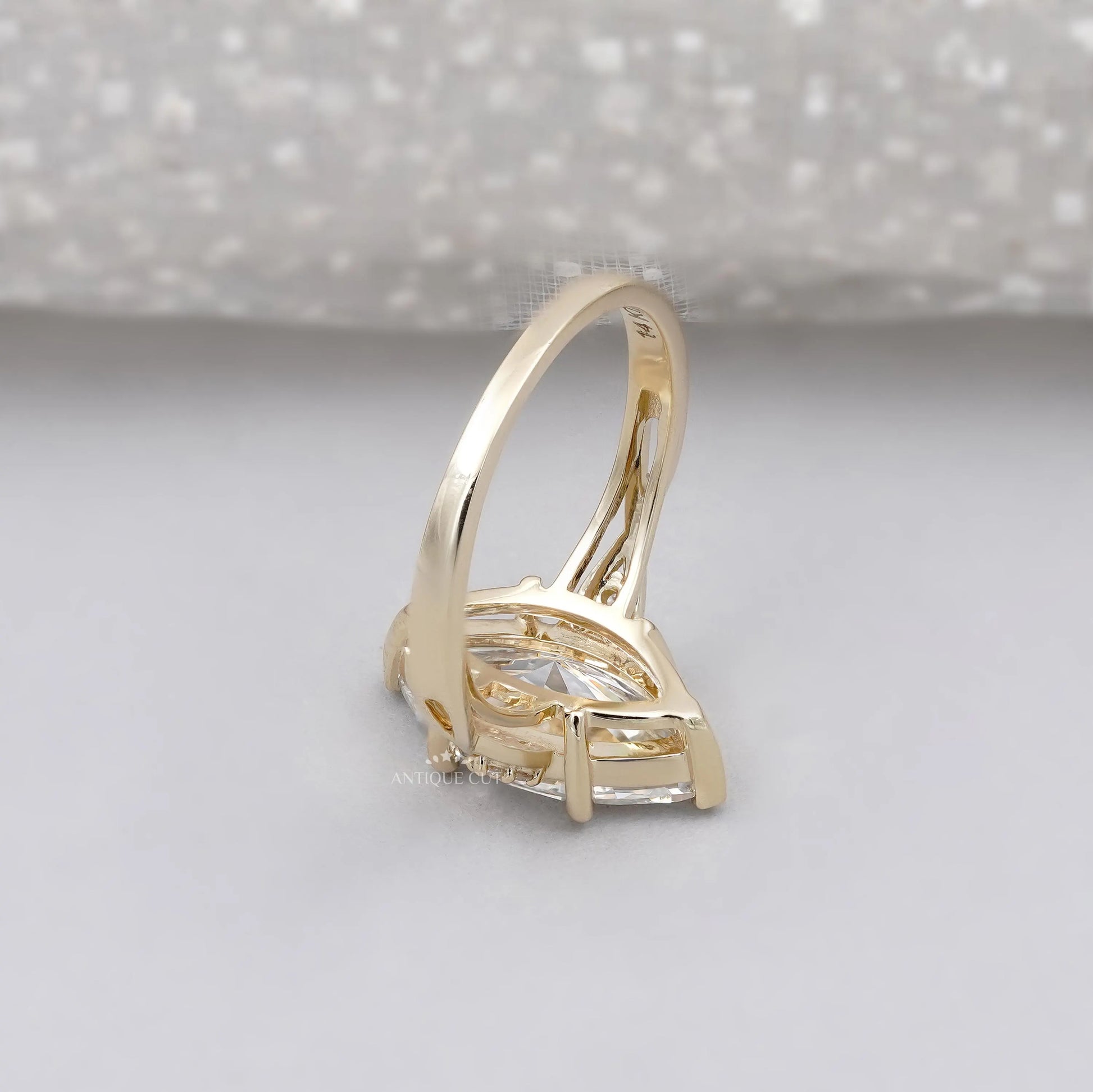 Elegant marquise solitaire diamond ring in yellow gold