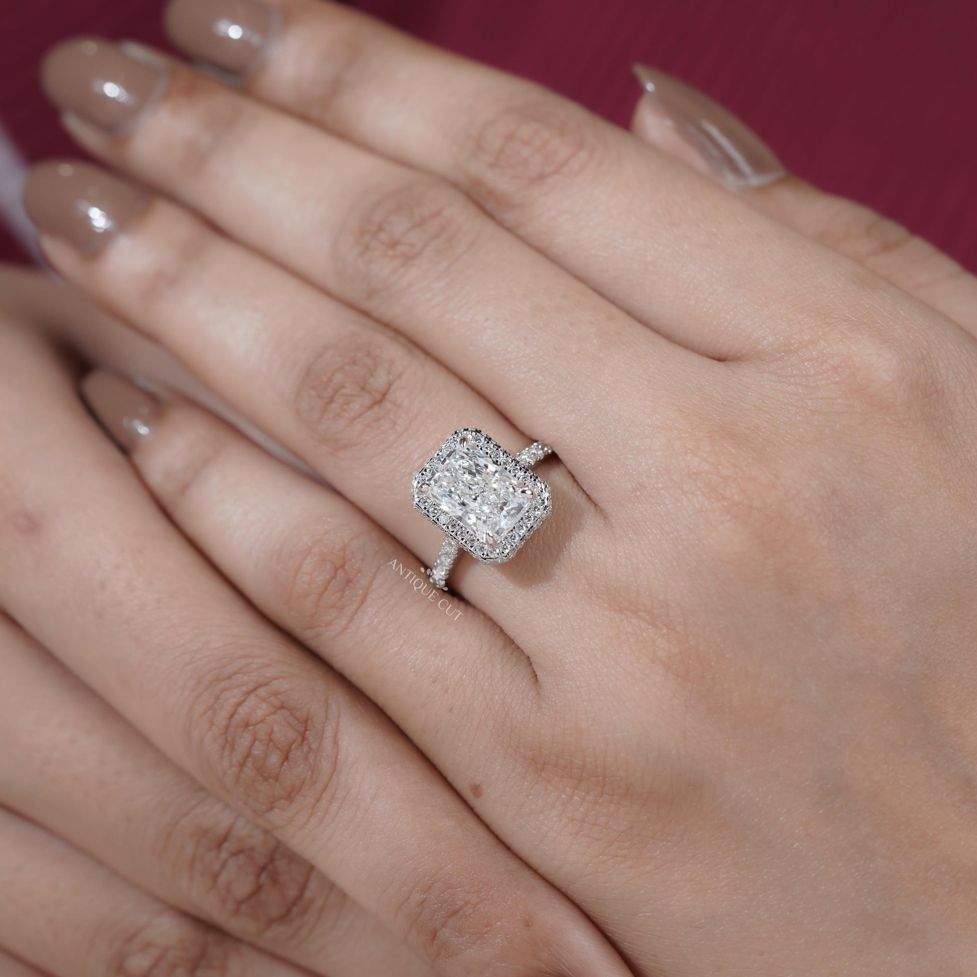 Radiant center stone with hidden halo view