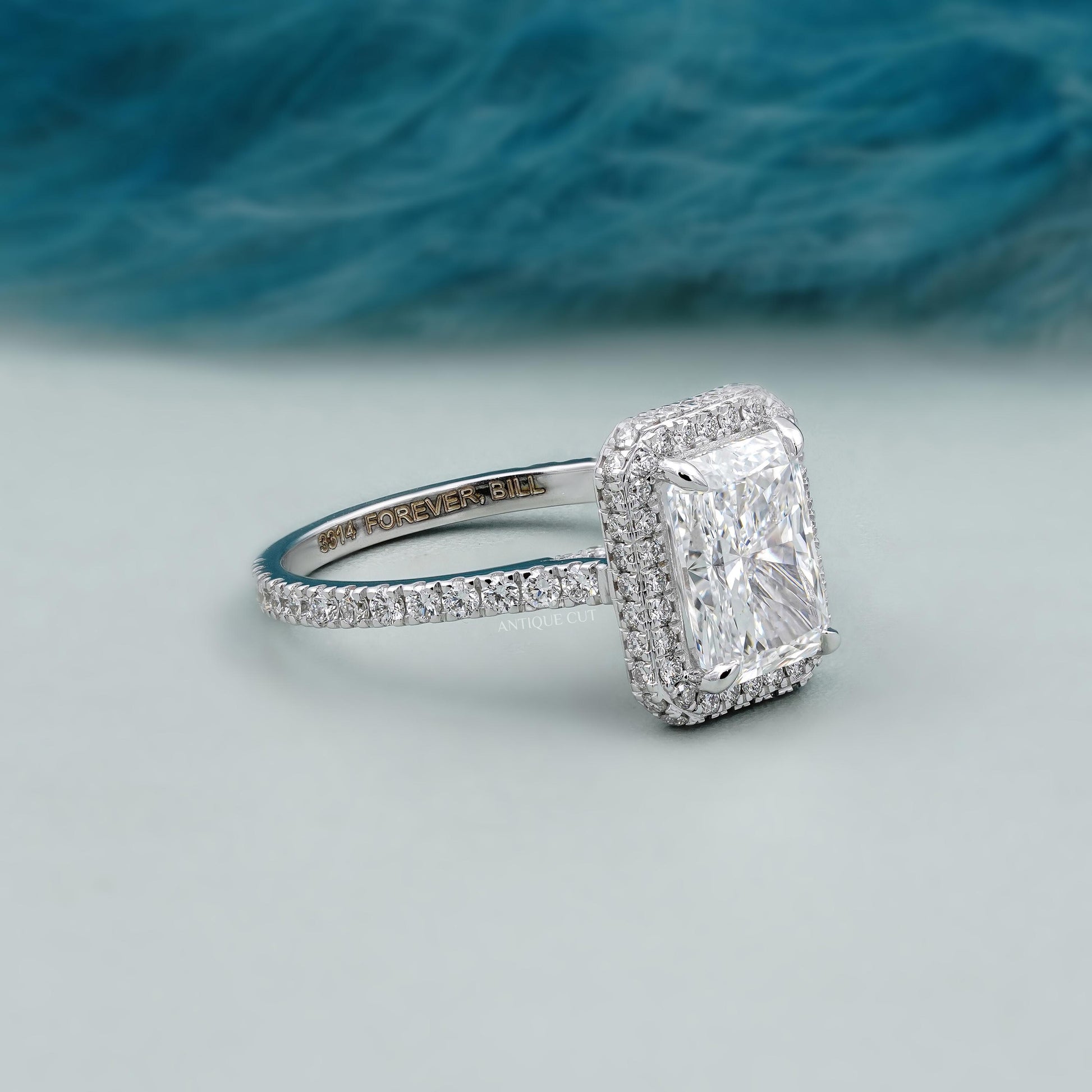 Elegant radiant cut halo diamond ring