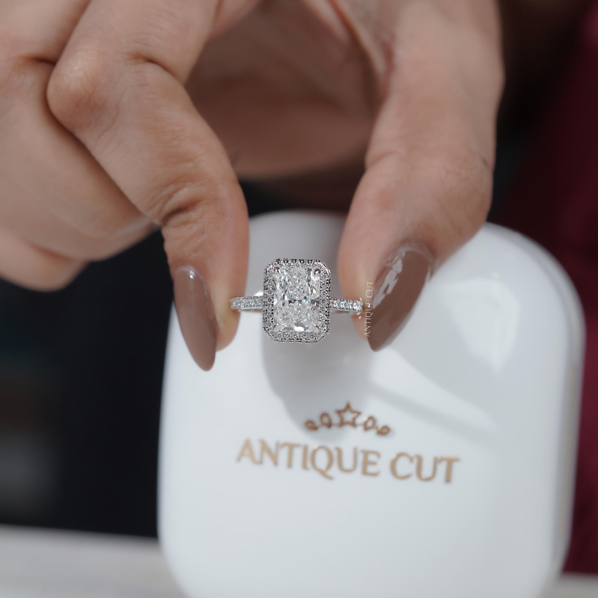Modern hidden halo engagement ring design