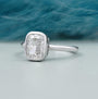 White gold bezel set engagement ring