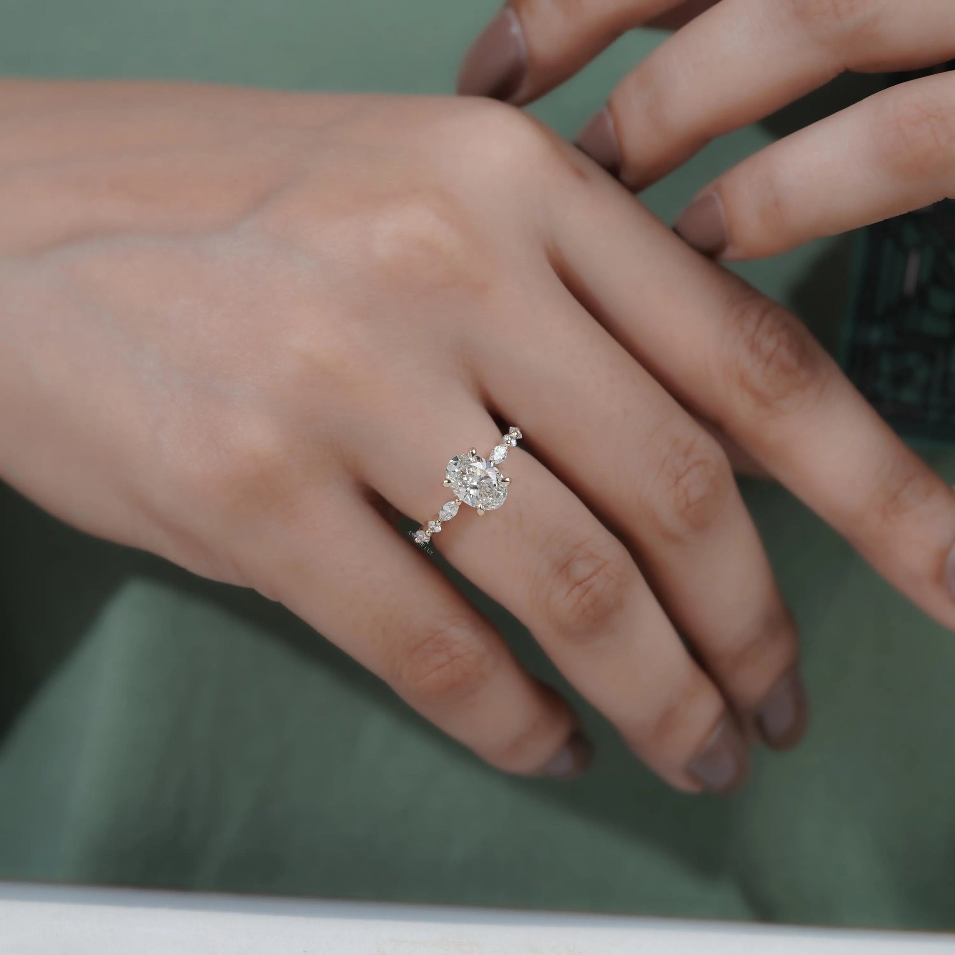 Elegant marquise side stone ring detail