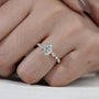 Oval wedding ring with pave band close-up