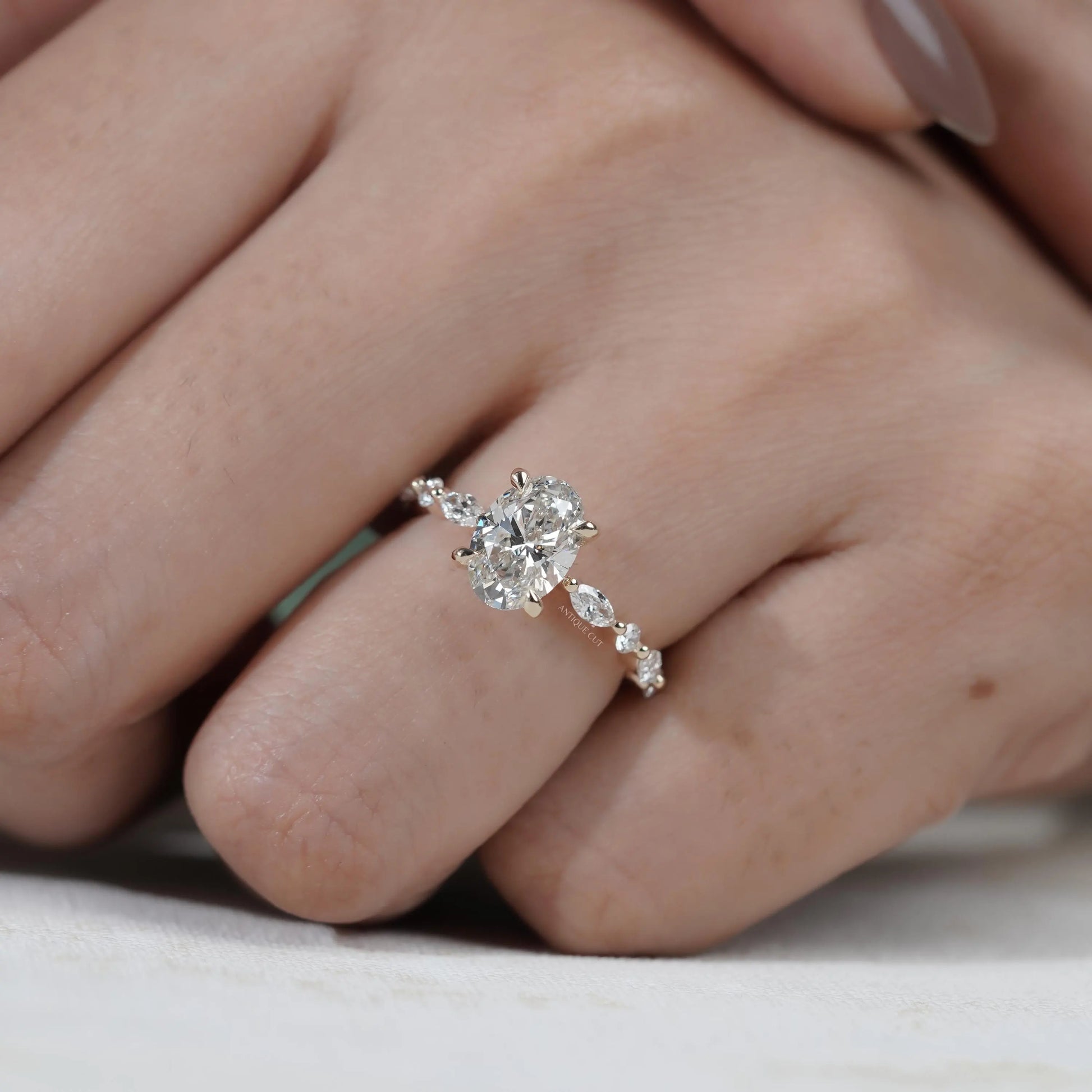 Oval wedding ring with pave band close-up