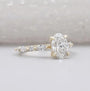 Yellow gold oval wedding ring close-up