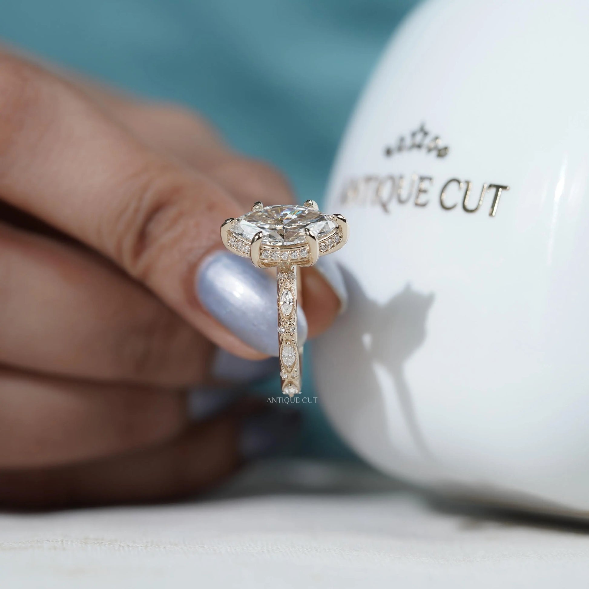 Fine jewelry marquise diamond ring with detailed vintage band