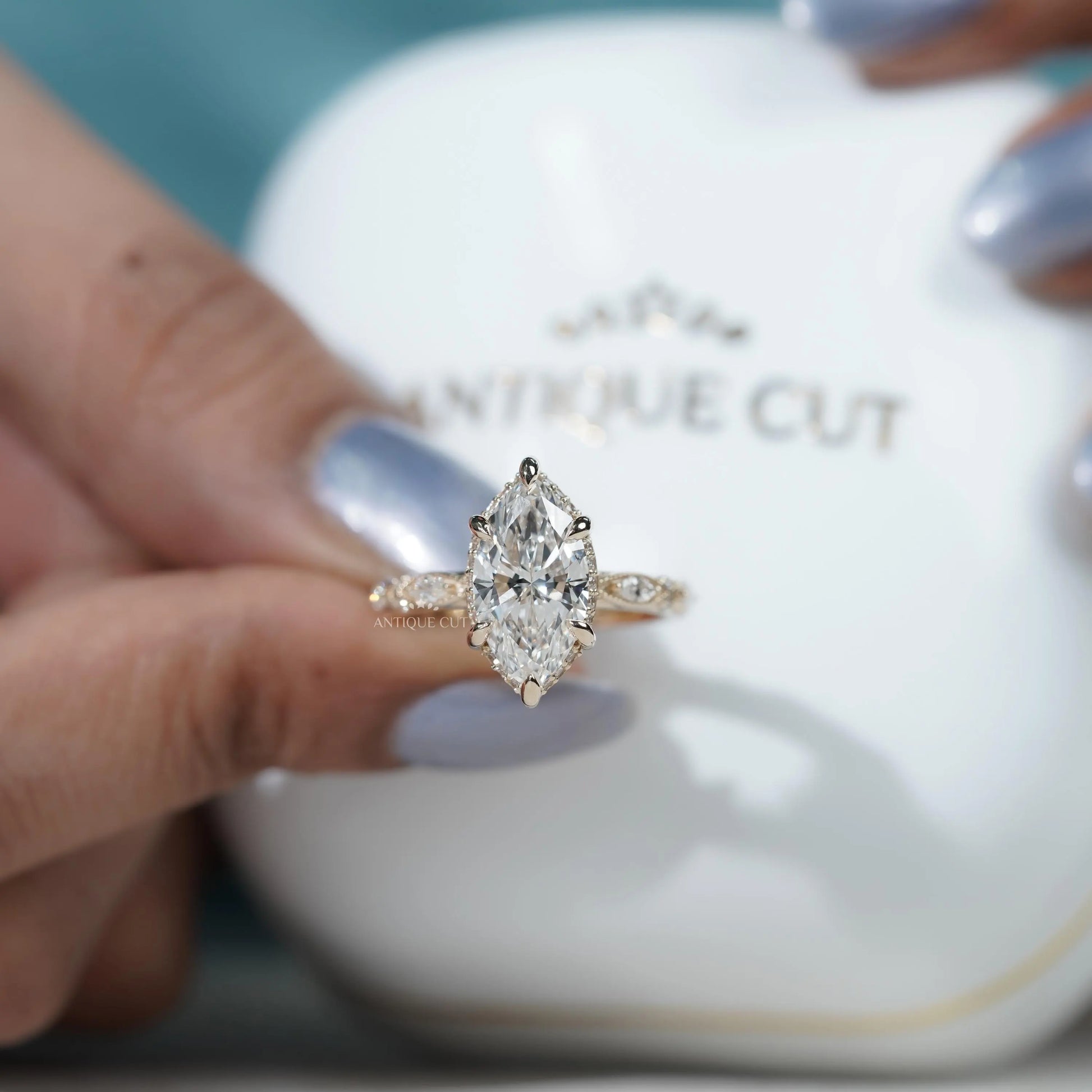 Elegant marquise solitaire engagement ring in yellow gold
