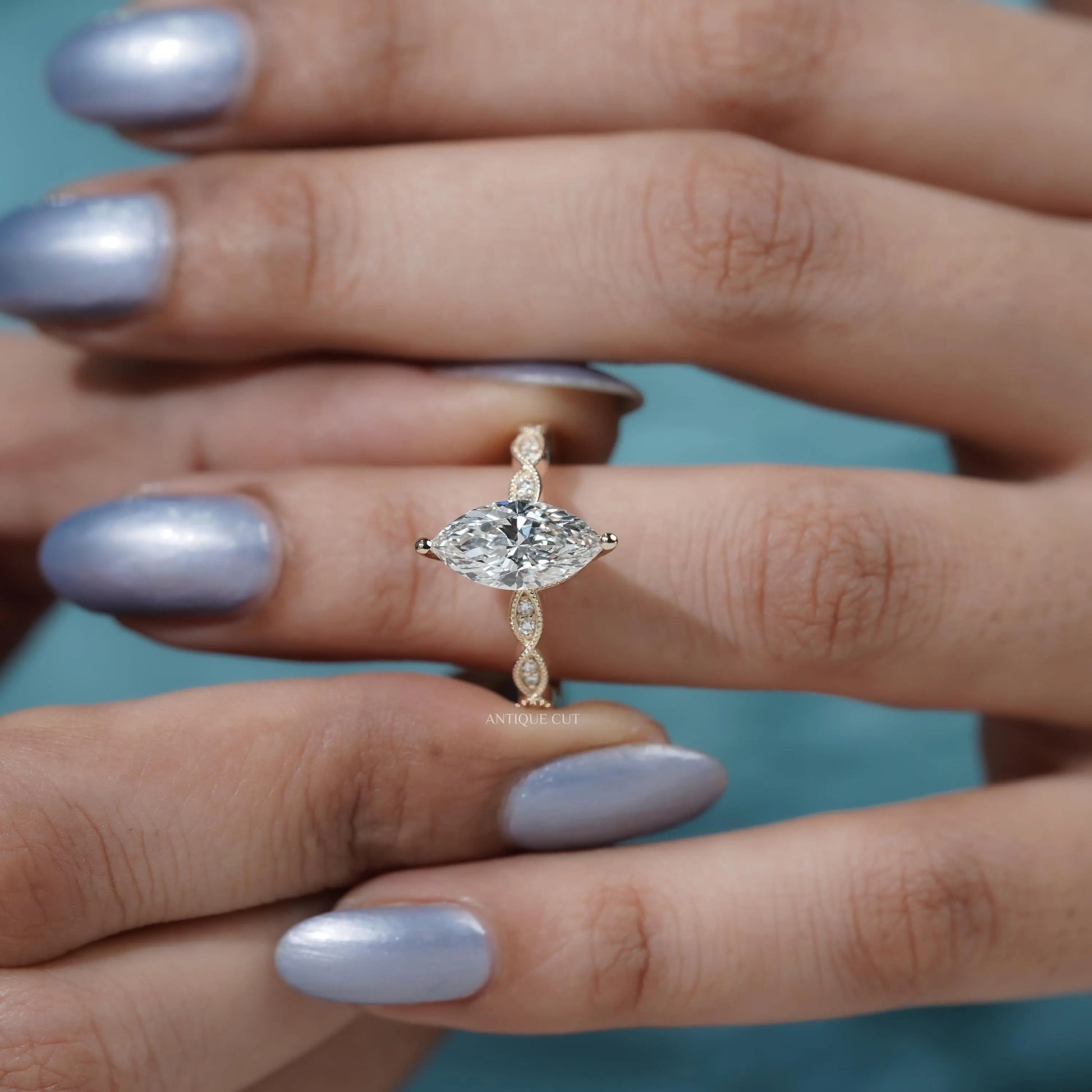 Classic marquise cut diamond ring with yellow gold band