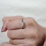 Modern horizontal oval diamond engagement ring