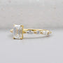 Lab grown emerald cut engagement ring with side diamonds