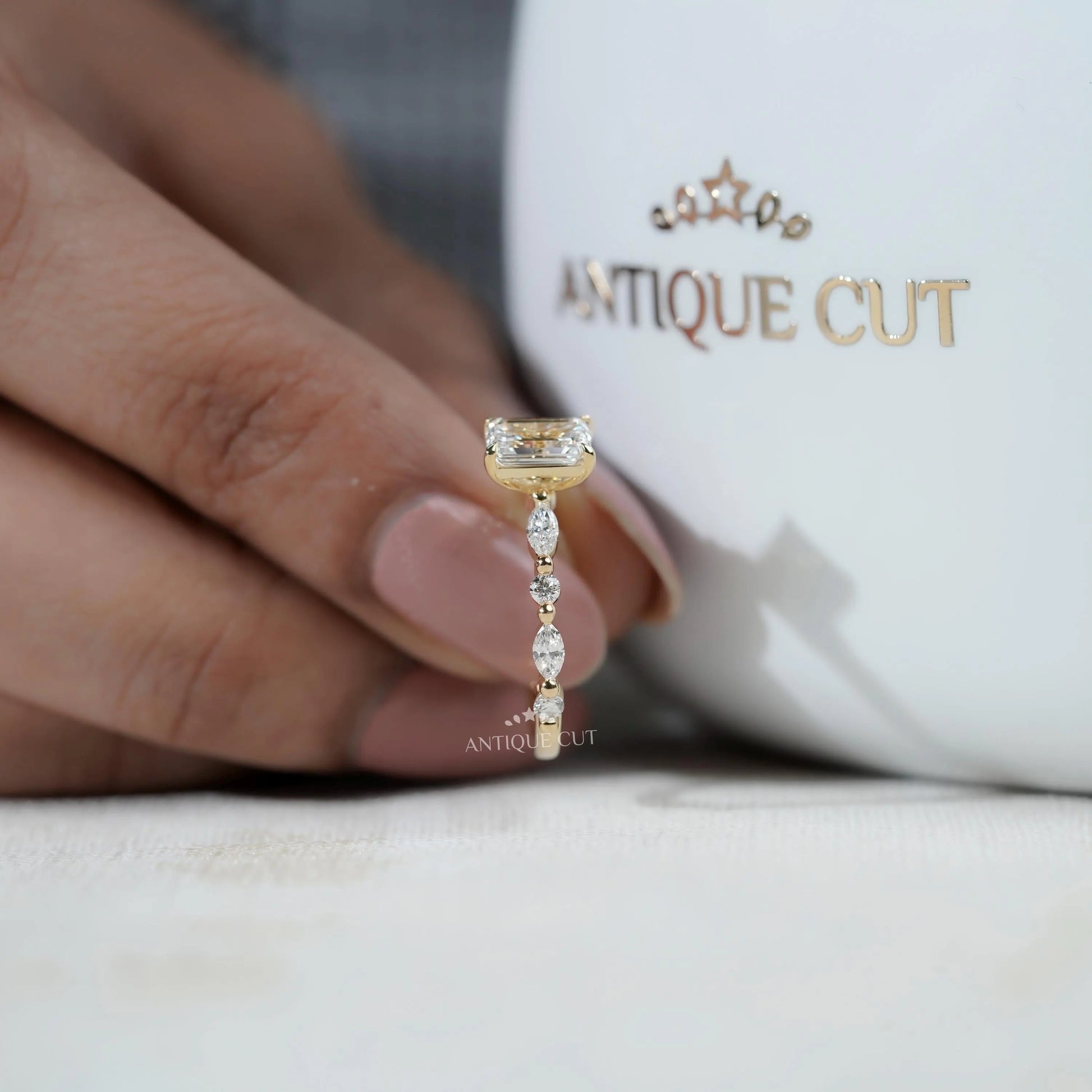 Yellow gold emerald cut diamond ring top view