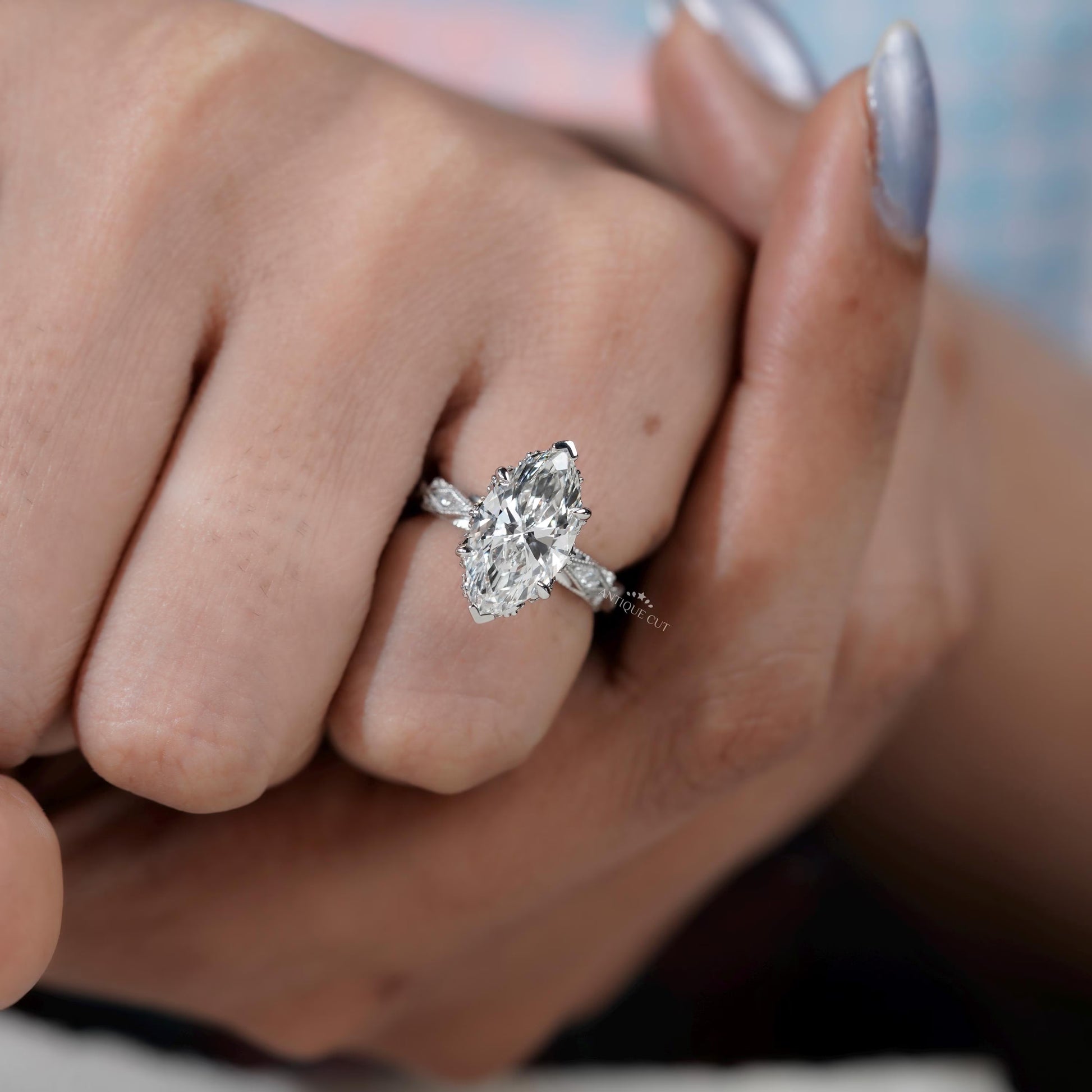 4 prong marquise diamond ring with V claws