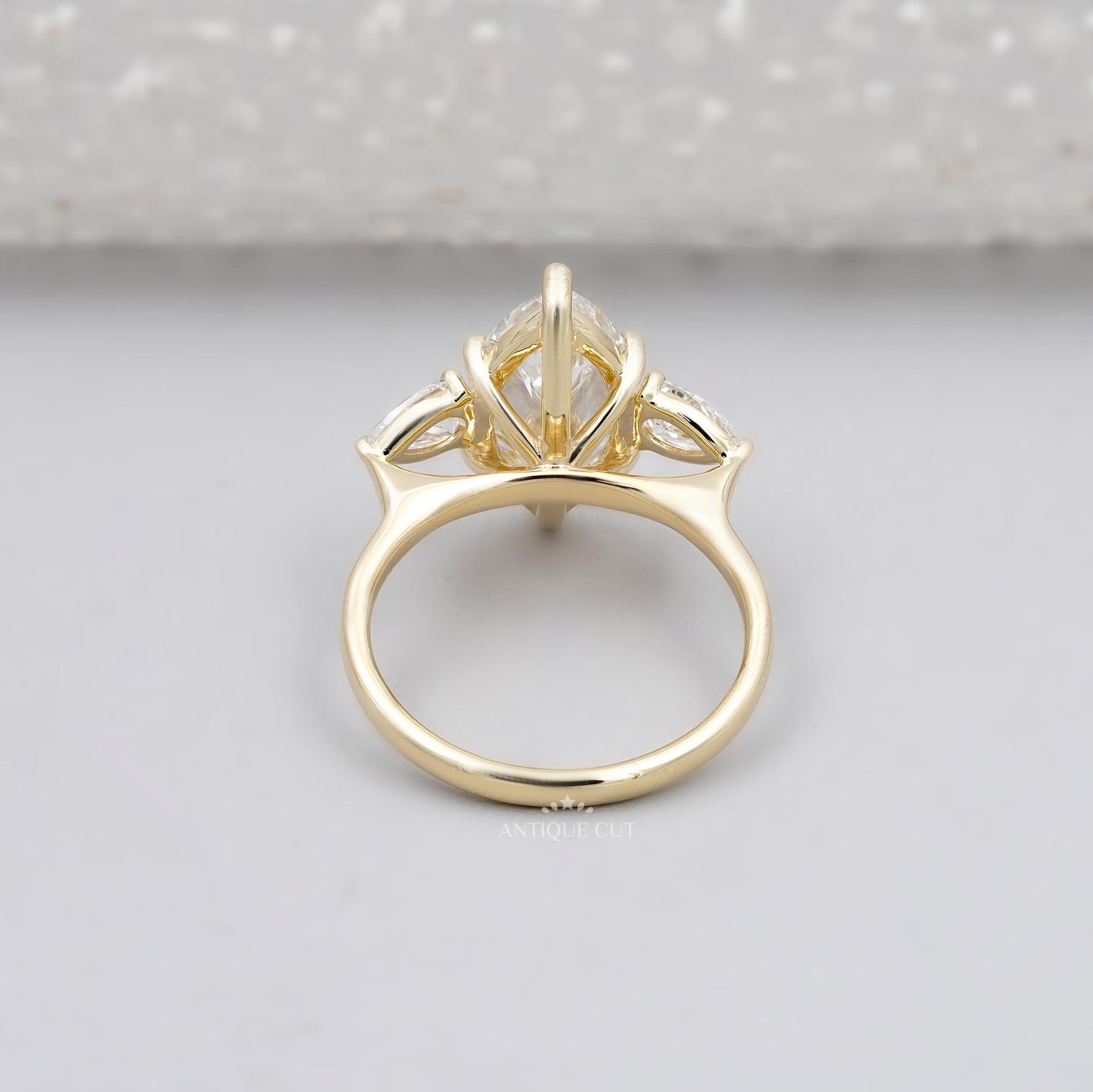Marquise cut diamond ring with three stone setting