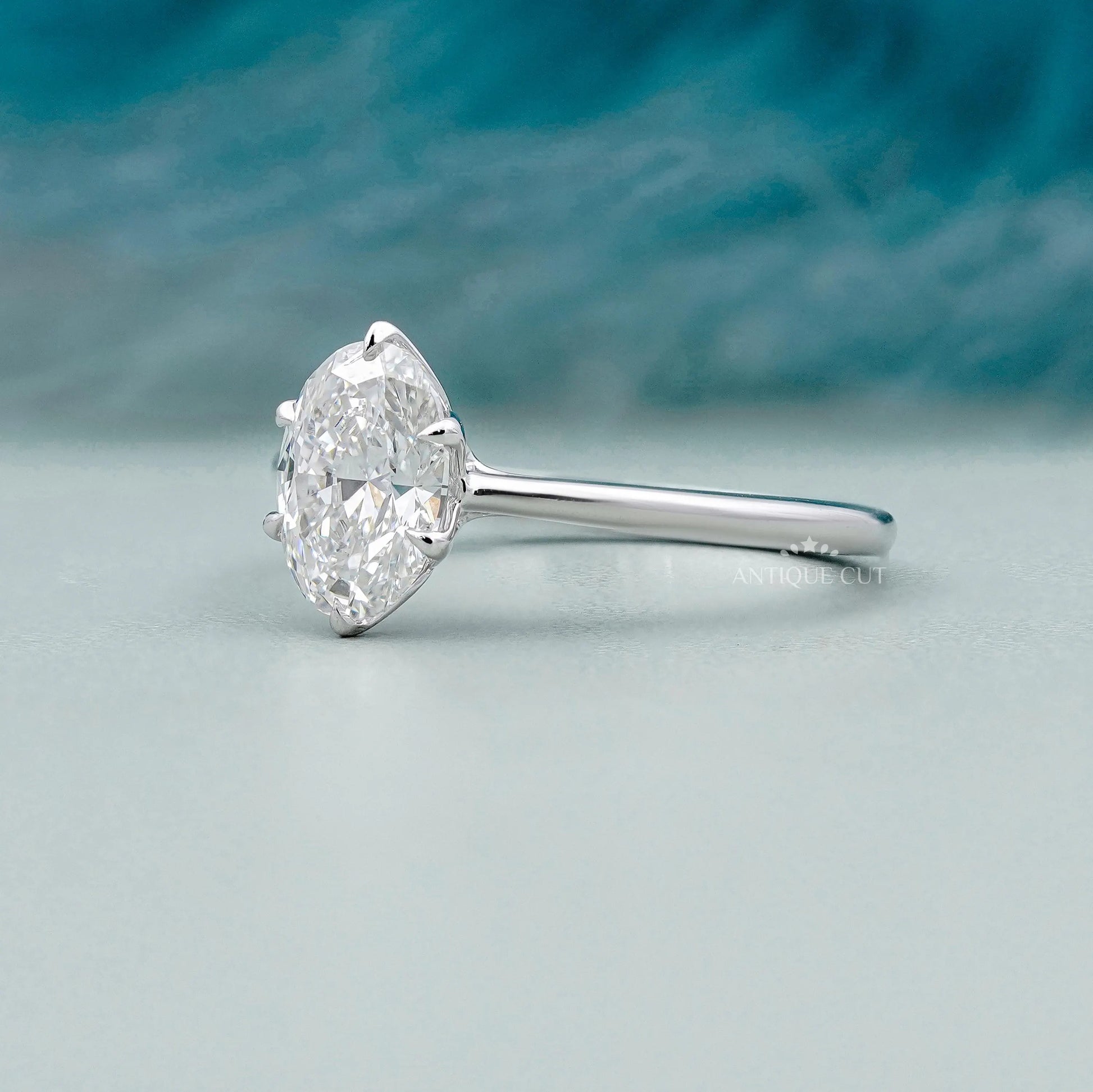 Lab grown oval solitaire engagement ring