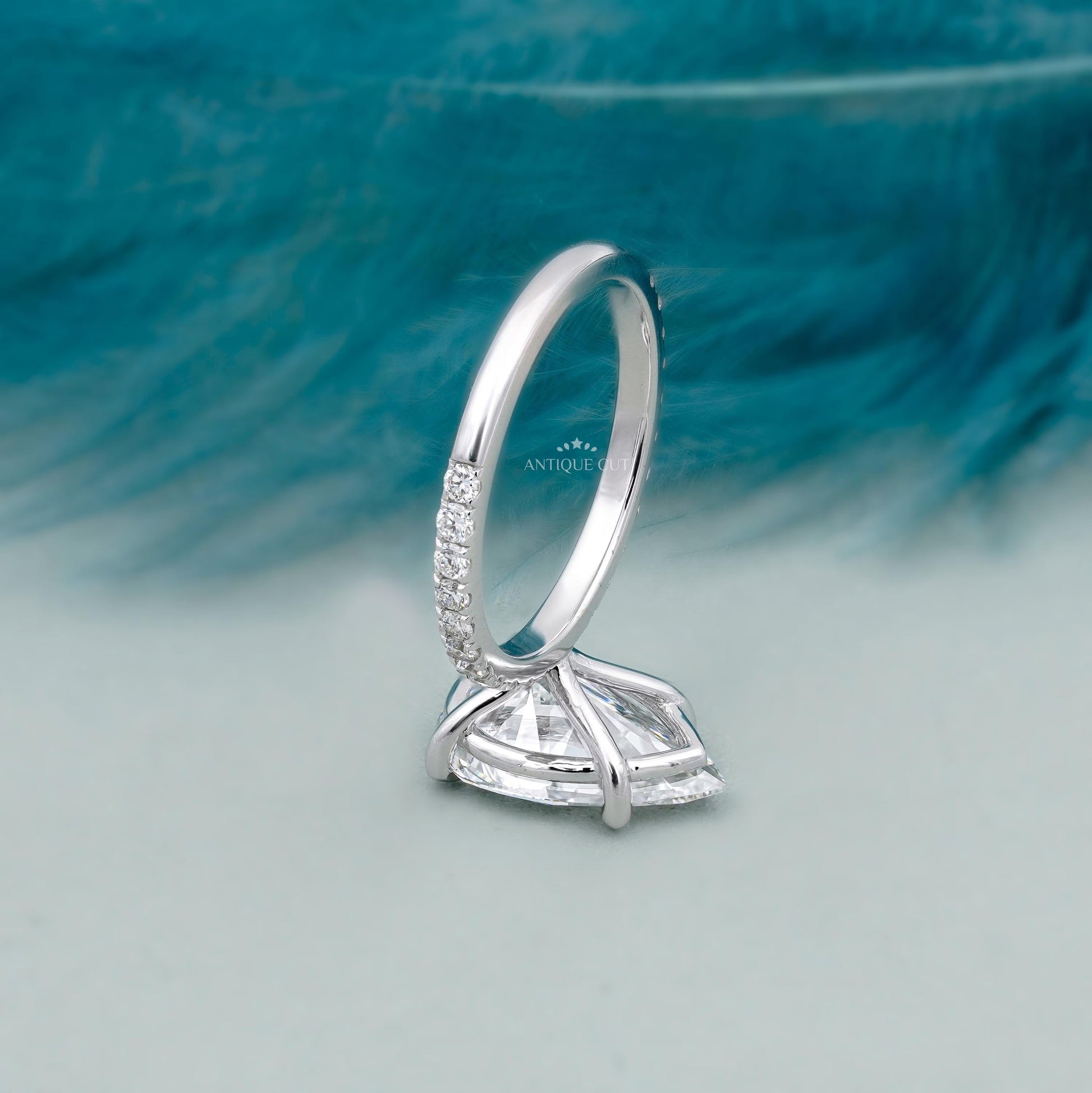 Pear shaped diamond ring with 4 prong setting close-up