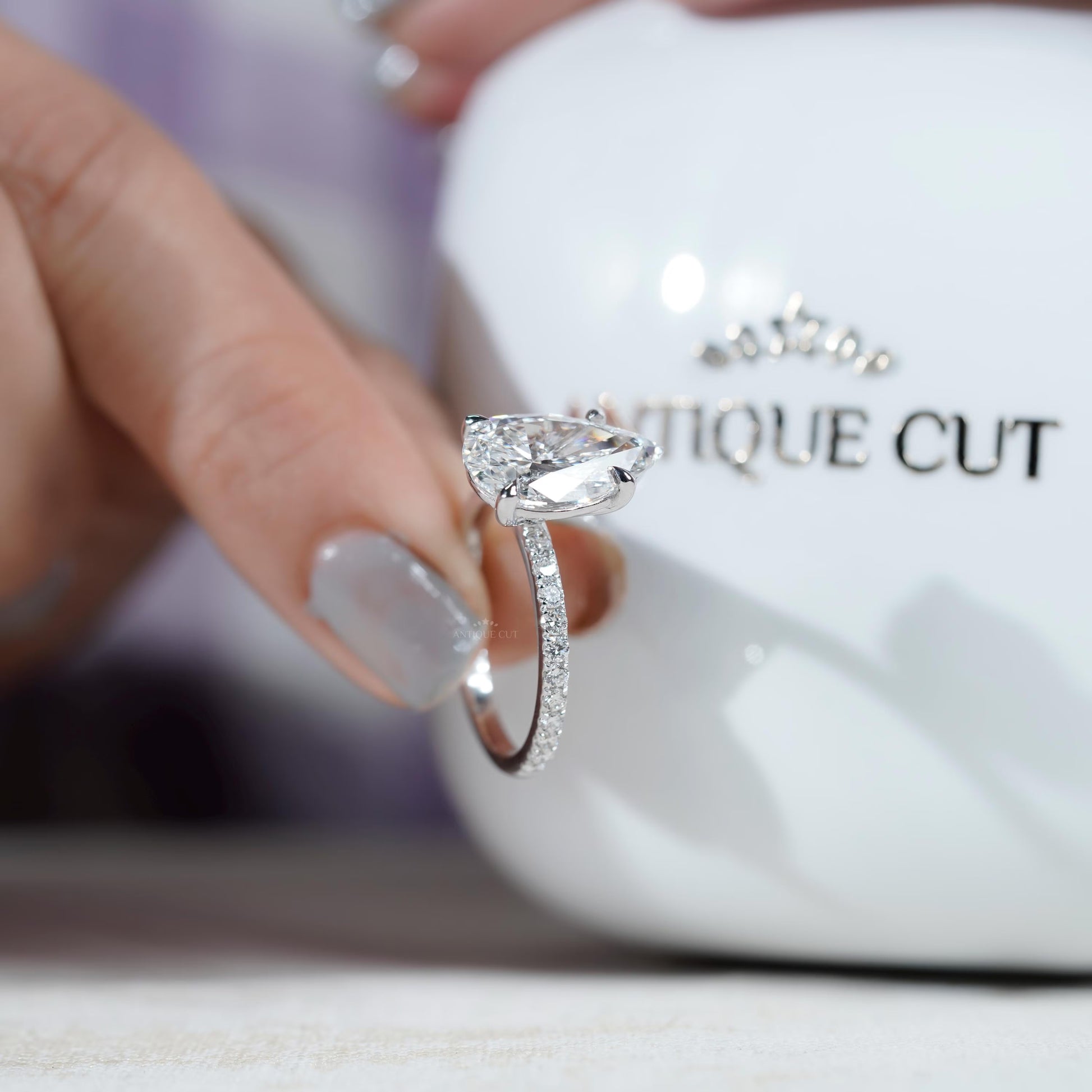 Pear diamond ring close-up white gold