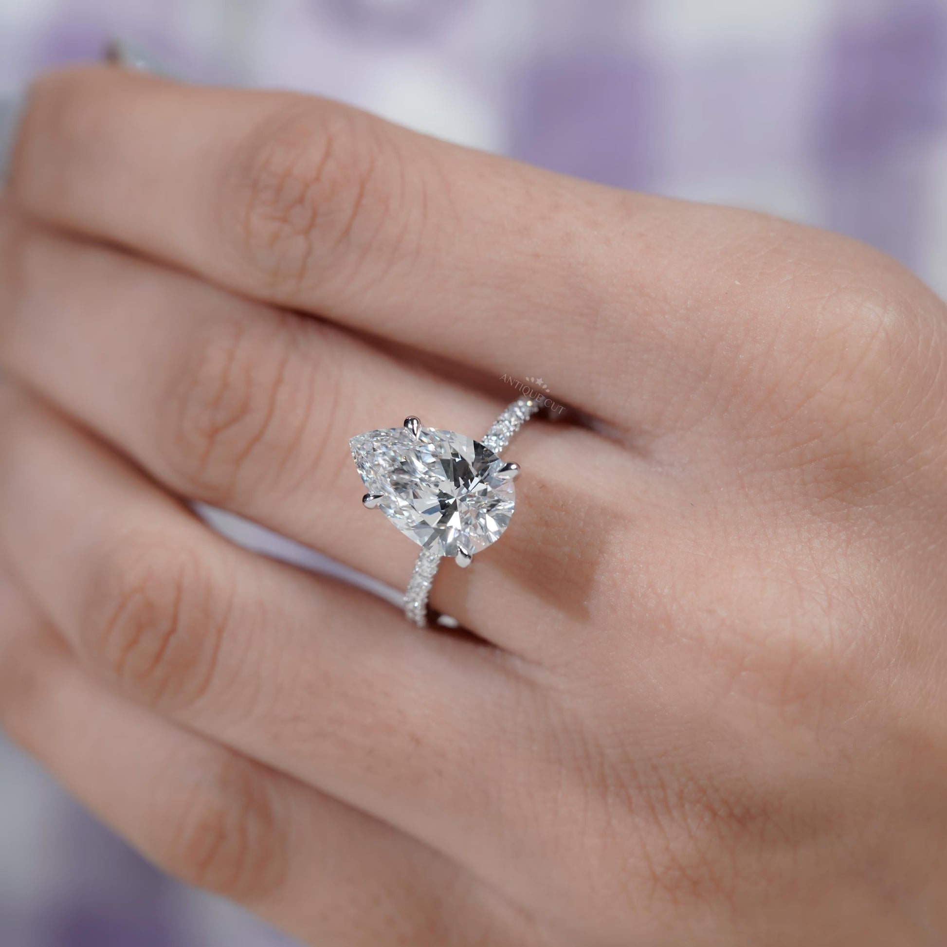 White gold pear diamond ring top view