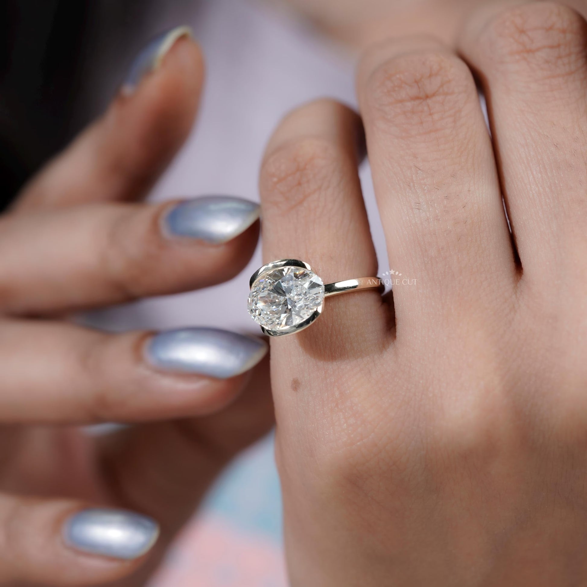 east west engagement ring oval solitaire