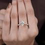 Luxury oval hidden halo engagement ring close-up