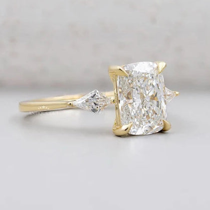 Cushion cut engagement ring with geometric kite diamonds