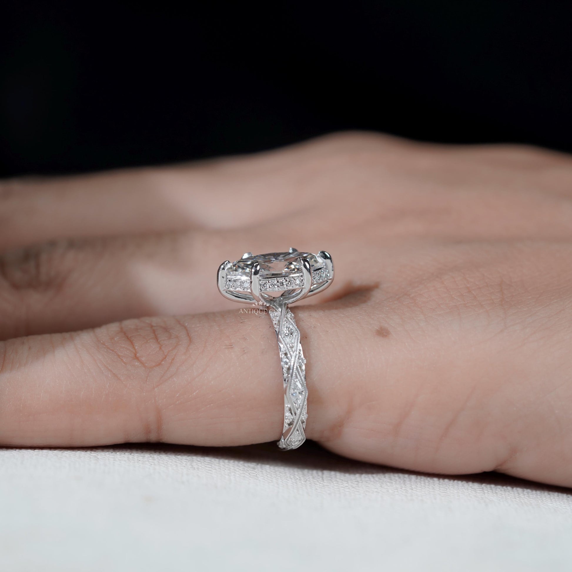 Marquise diamond proposal ring with vintage inspired design