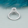 Split shank white gold engagement ring with oval center stone