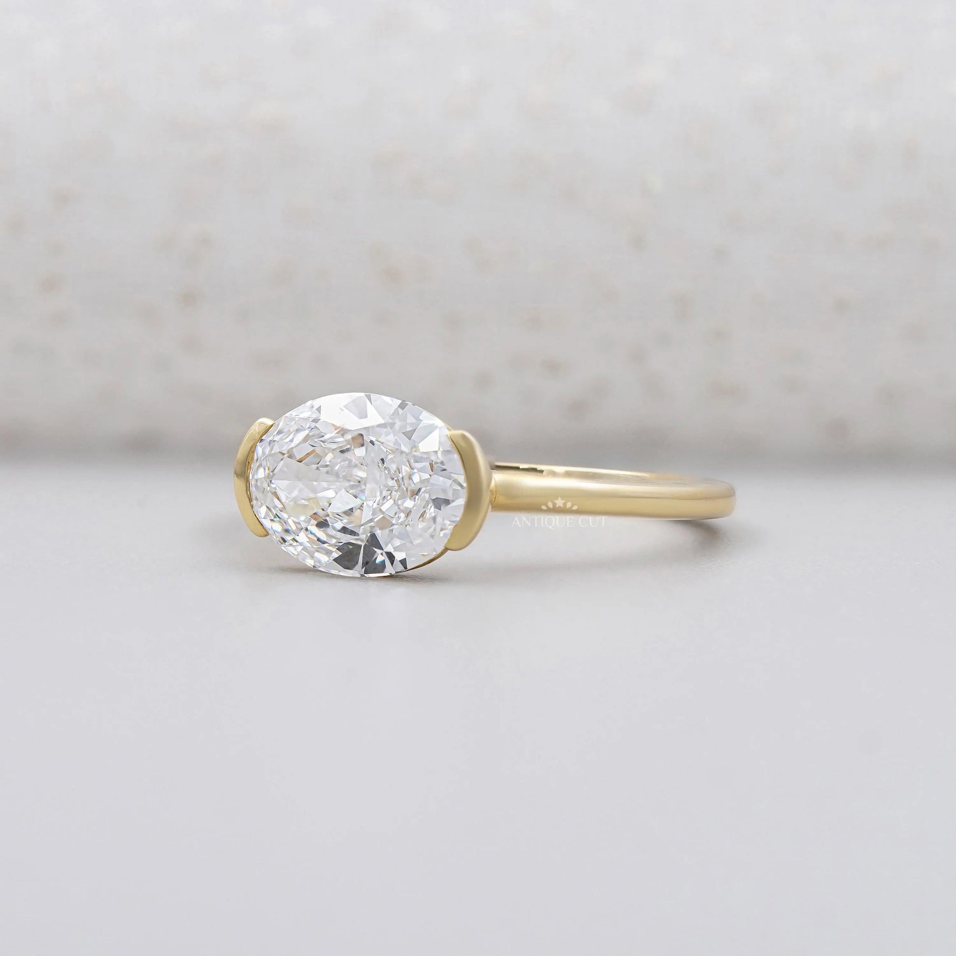 East West Engagement Ring With Oval diamond | Half Bezel Set Ring |  White gold