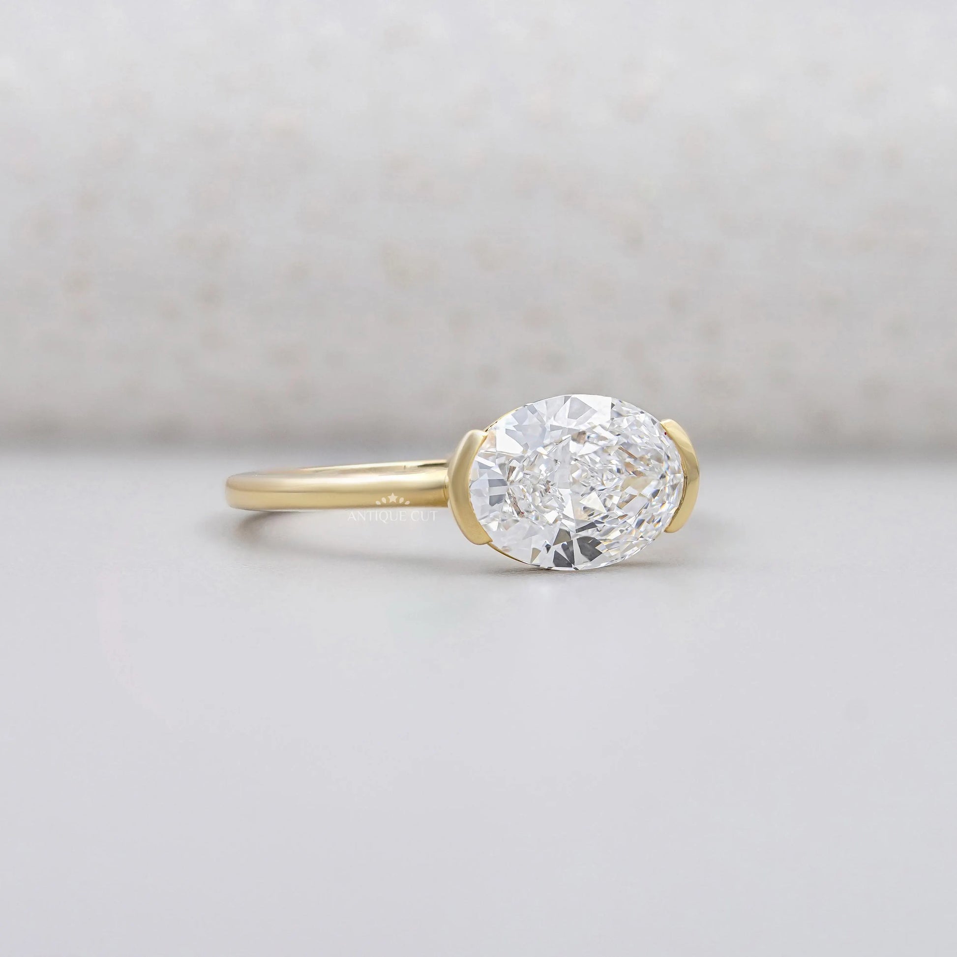 East West Engagement Ring With Oval diamond | Half Bezel Set Ring |  White gold
