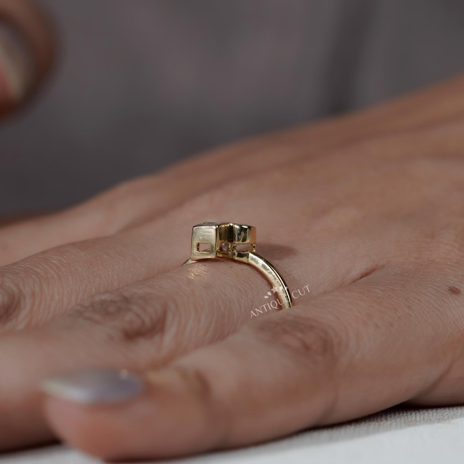 Elegant J shape ring front view yellow gold