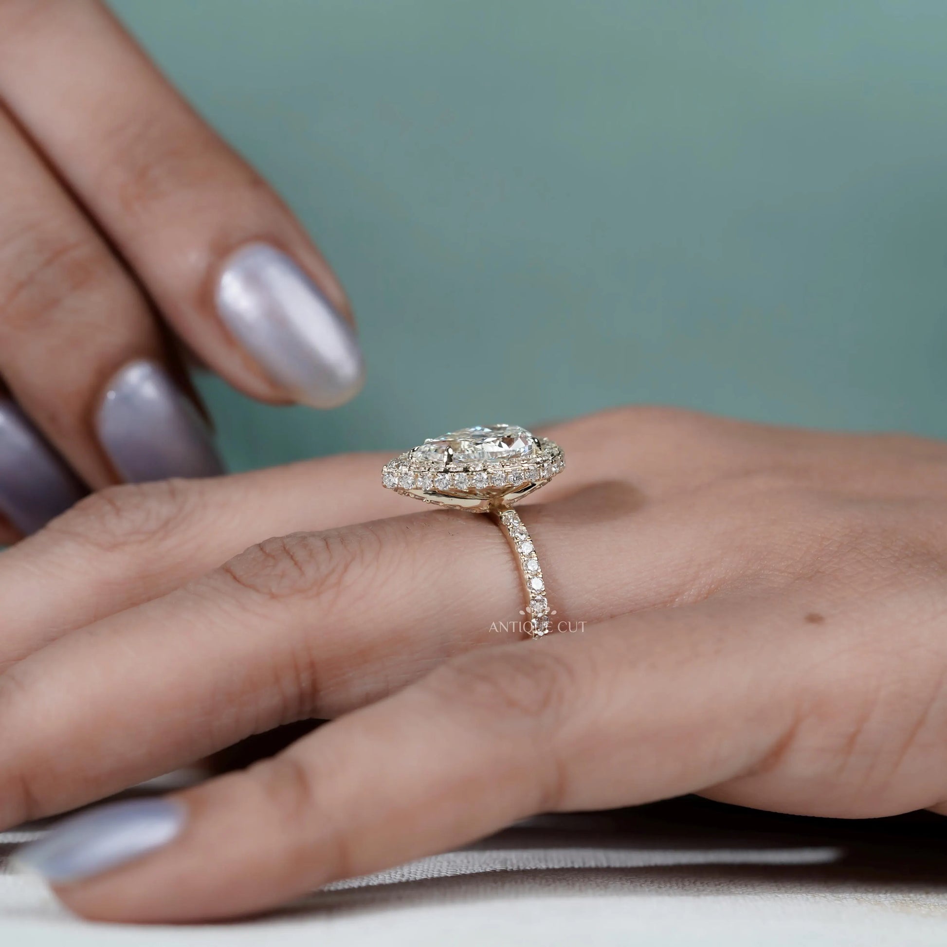 Hidden halo white gold engagement ring