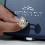 White gold halo engagement ring with pave diamonds