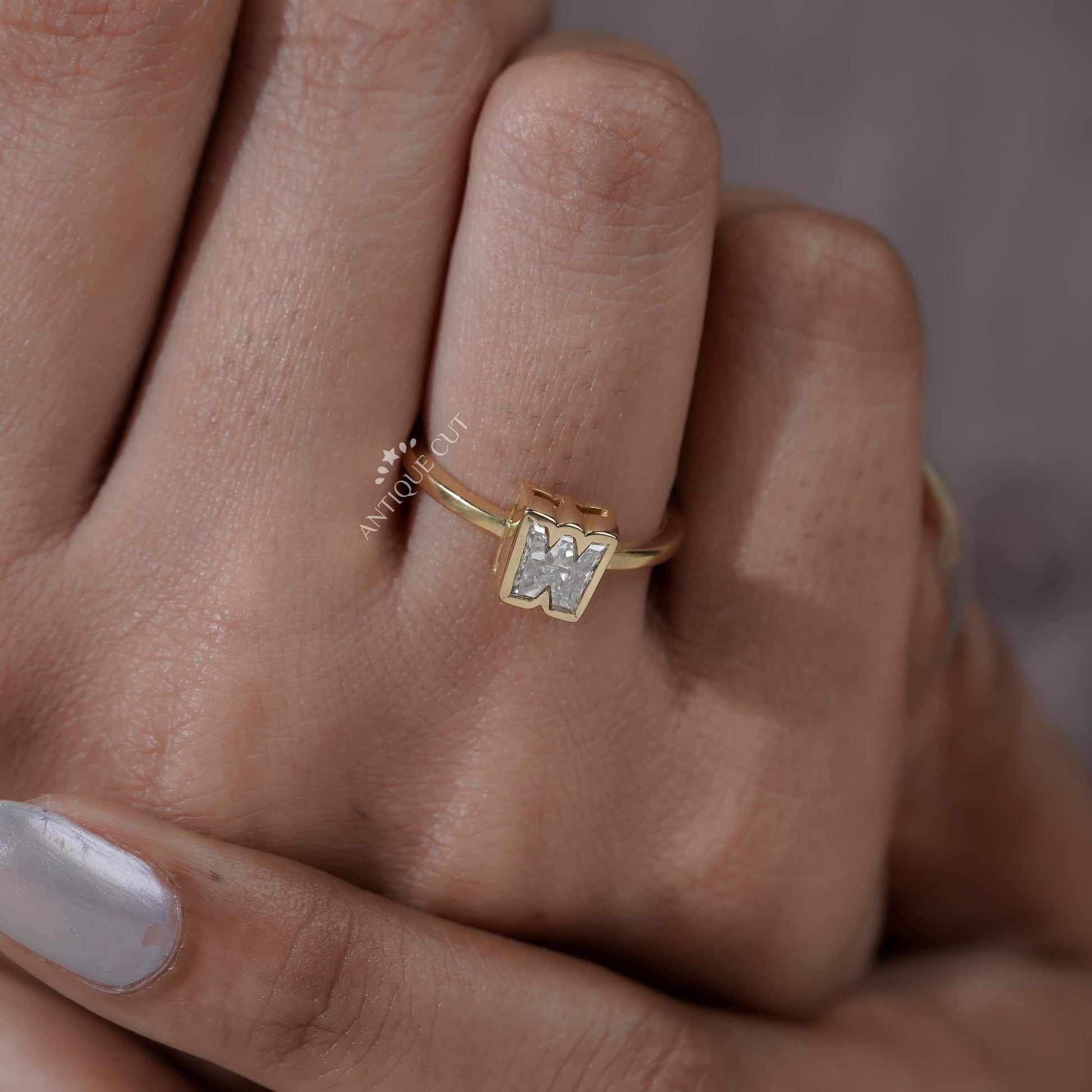 Elegant W initial diamond ring with gold setting