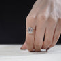 Modern emerald engagement ring close-up