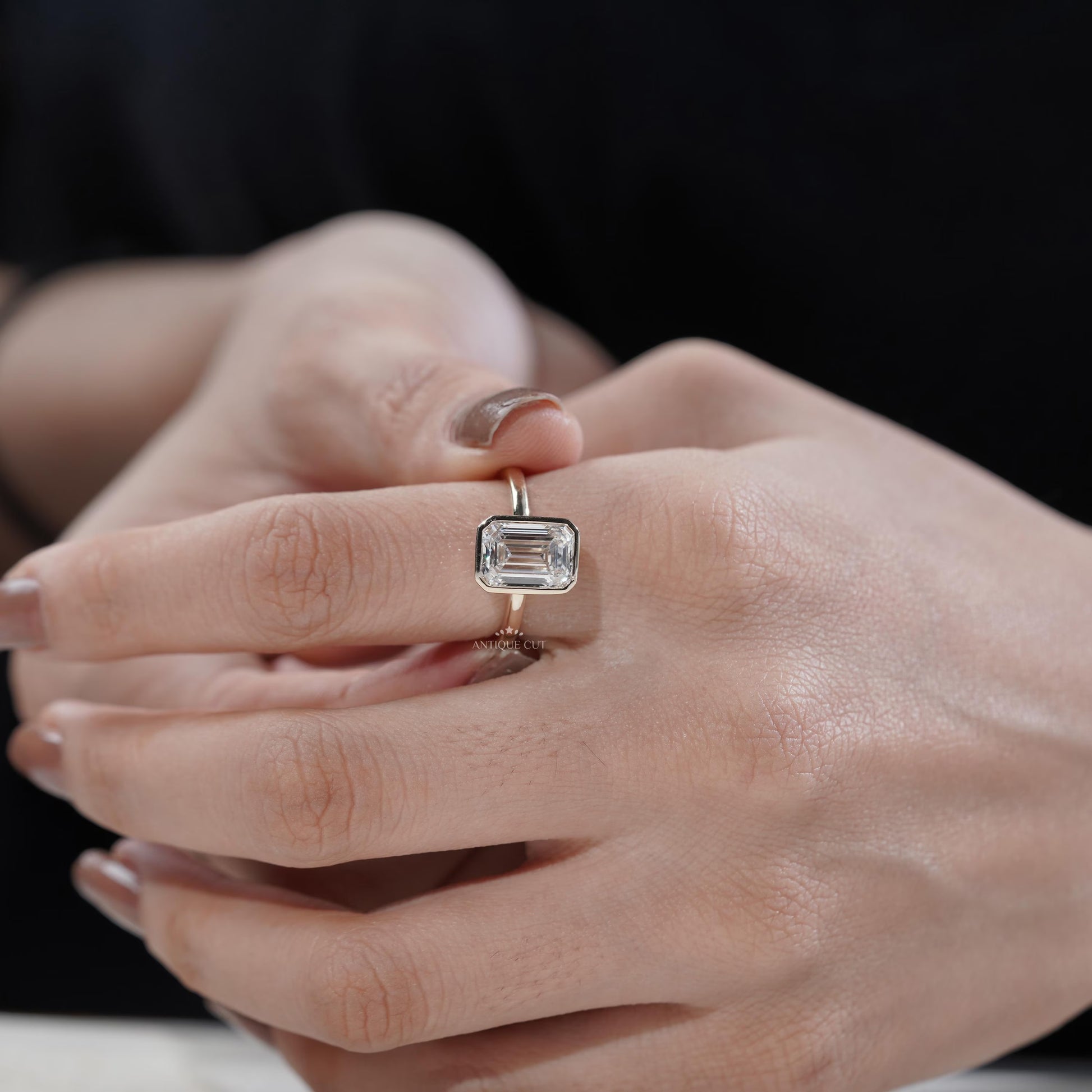 Classic yellow gold emerald engagement ring