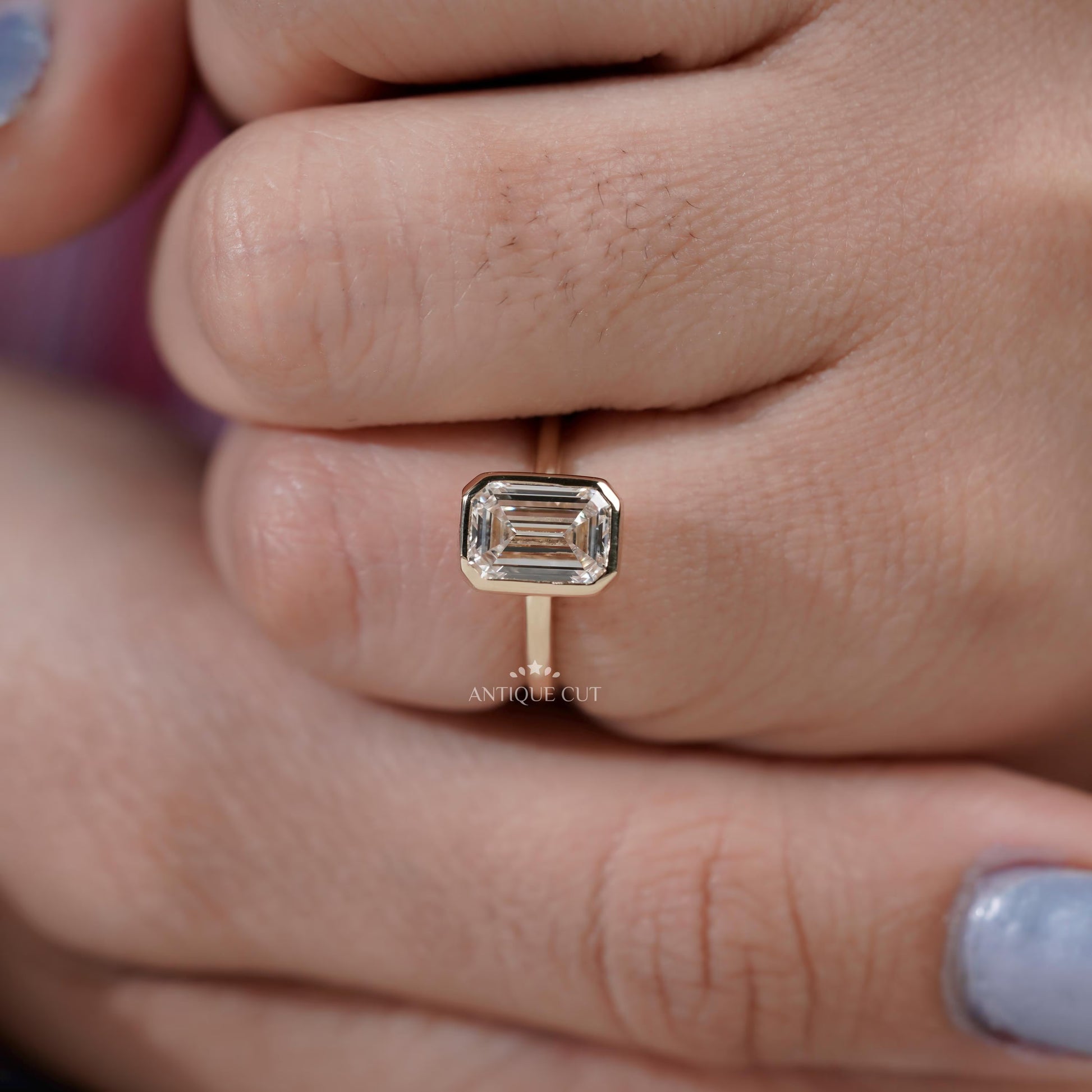 Yellow gold emerald cut diamond ring top view